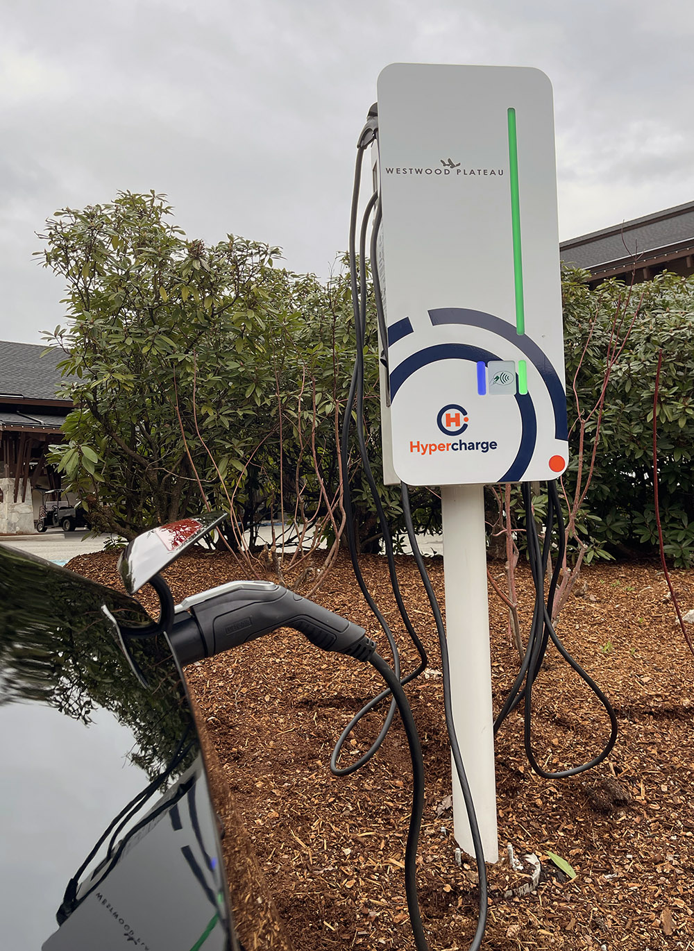 Hypercharge JuiceBar Gen 3 EV Charging Station charging a Tesla Model 3